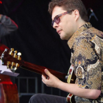 Reg Schwager on guitar